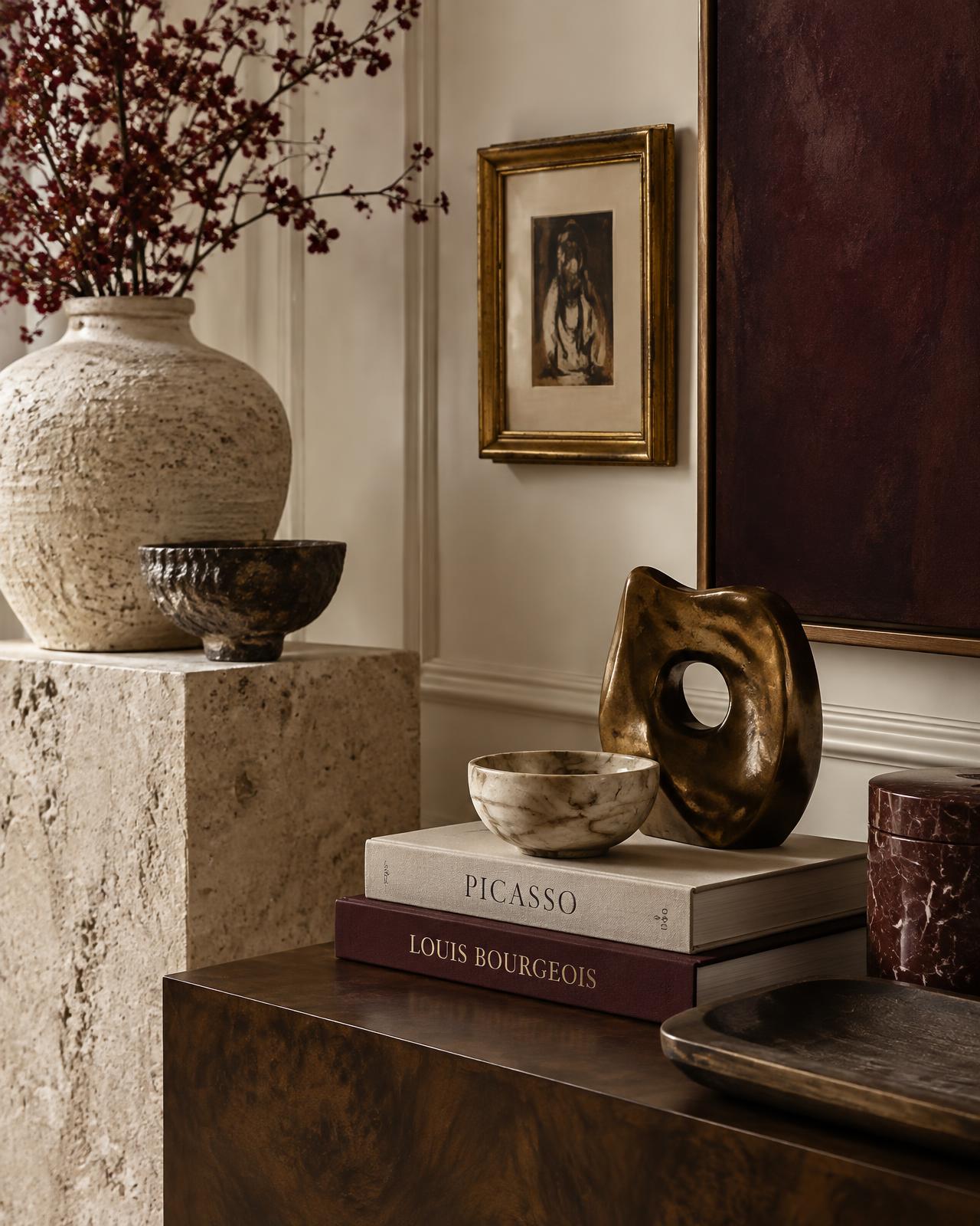 Selection of ceramics, art books and sculptural objects